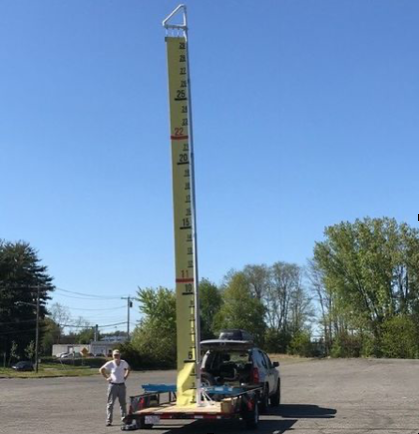 Easthampton resident Vinny Valetutti’s constructed a 30-foot-tall “Sea Level Rise Ruler” to raise awareness about the dangers of rising sea levels due to climate change and ice caps melting. (Courtesy Olivia Greeley)